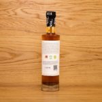 Kräuteressig Rosmarin in Flasche von hinten